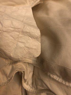 Why is the label so wrinkled from a wash of course!