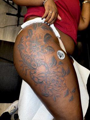 Custom thigh tattoo
