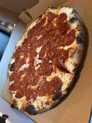 Medium thin crust pepperoni pizza.