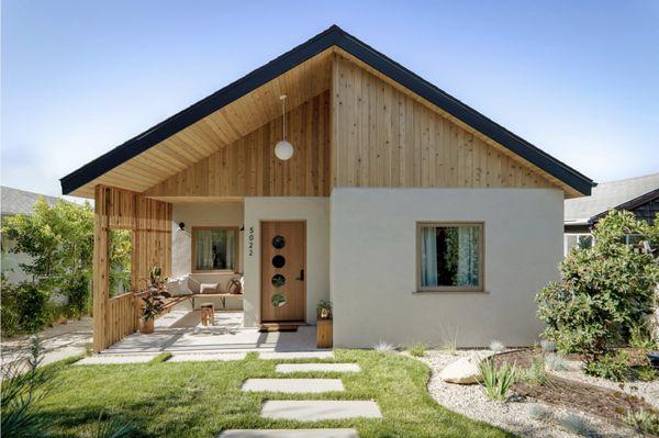 Green Advisor poured custom pavers, added grass, created a gravel and plant section, added irrigation, lighting, etc.