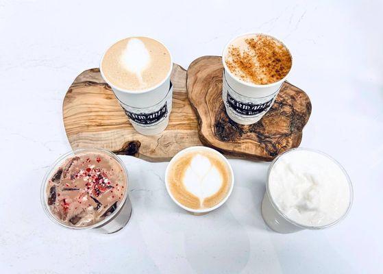 Left to Right: Peppermint Mocha (iced), Gingerbread Latte, Amaretto Cortado, Haus Chai, Sugar Cookie Milkshake