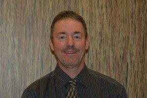 Dr. J. Brett Comstock