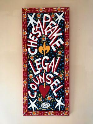 Interior sign with office name, painted by New Orleans artist Simon