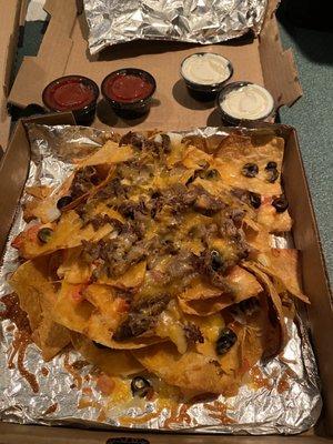 Nachos with shaved steak