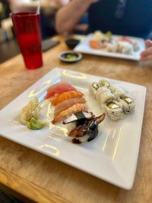 Lunch Special with 7 pieces of nigiri and a Philly roll.