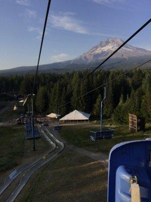 Riding the lift to the top of the downhill mountain bike park August 2019
