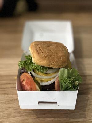 The Big Shack: 2 qt. lb. Angus beef patties, secret sauce, lettuce, American cheese, pickles, tomatoes, onions & 3-layer potato bun | $9.99