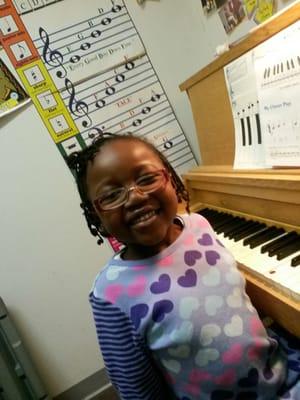 She is learning how to play beautifully