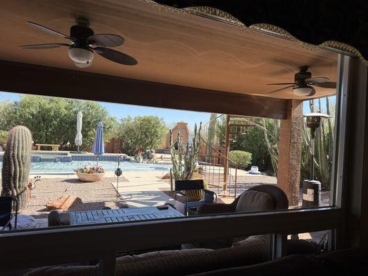 View from the Family room (sorry pool cover is in to heat up the pool) Out windows are so clean it seems like they aren't there- LOL!