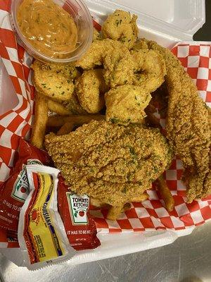 $18 Fried Shrimp and Fried Fish with Fries
Homemade butter on side (CAJUN LOUD) with ketchup and hot sauce