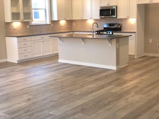 Luxury vinyl plank kitchen remodel.