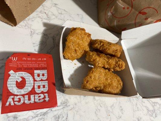 Looks like chicken nuggets have been sitting for a couple of hours they are cold and hard