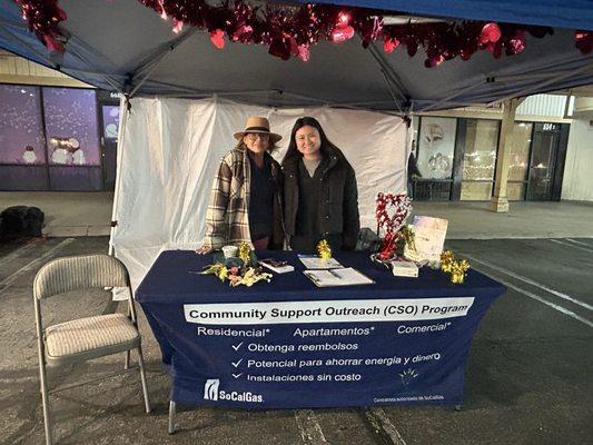 Santa Anna, Booth to sign up reducing cost with their energy bills and water bill. Community support, outreach, community, efficient .