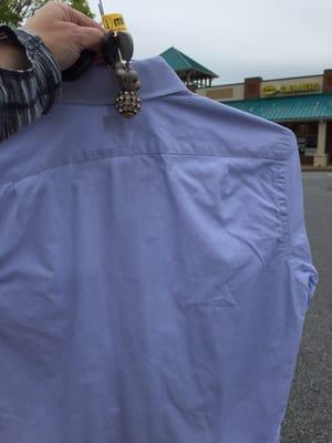 This is the shirt I had them re-press, immediately after walking out of the shop. Photo taken from Parkway parking lot.