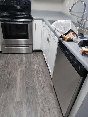 Different view of kitchen with dishwasher