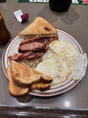 Meat Lover breakfast. Sausage, bacon, kielbasa, 3 eggs + toast. Unlimited coffee refills.