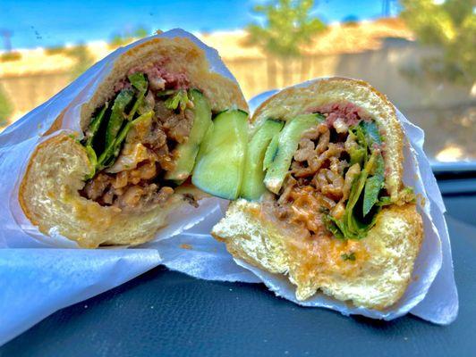 Spicy pork banh mi with pate