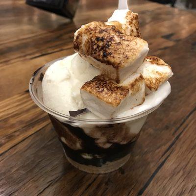 S'mores Sundae from Crank & Boom Ice Cream Lounge. Graham crackers crumbs, chocolate sauce over Vanilla ice cream and torched marshmallows.