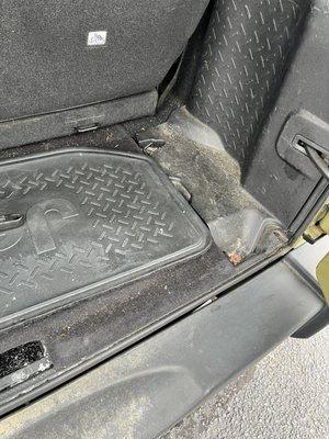 Area behind seat and exterior bumper