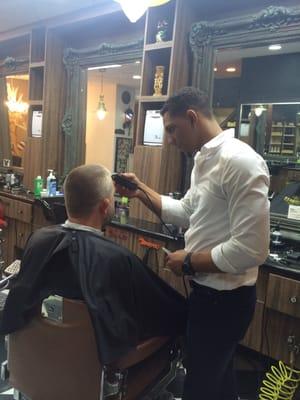 Interesting shop nice music , also a cigar shop wow .....cool barbers ....