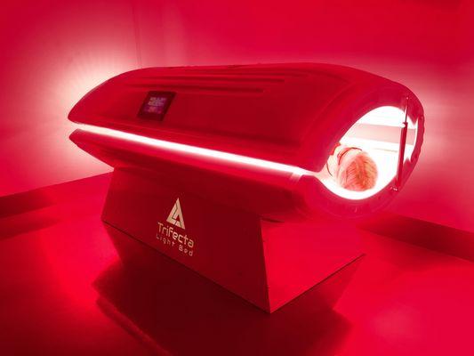 Full body red light therapy bed followed by a whole-body vibration session for a total of 30 minutes per session.