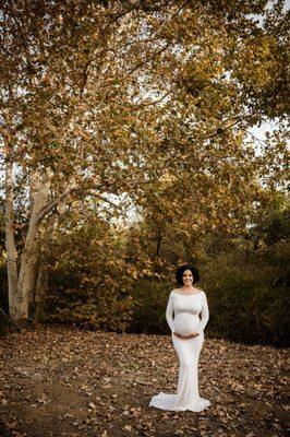 Maternity picture in a park.