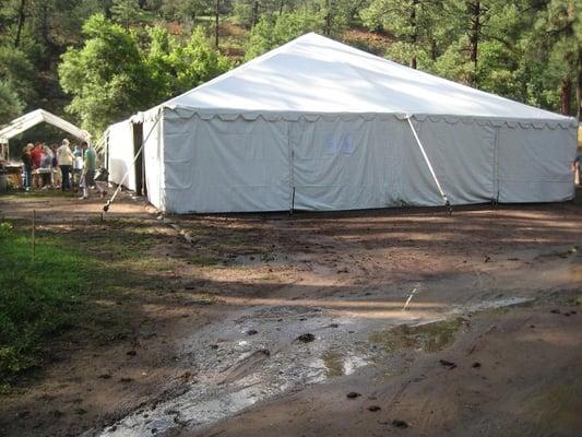 THE TENT WE HAVE PUT UP EVERY YEAR WHERE WE ALL SHARE MEALS TOGETHER. WE NEED IT BECAUSE SO MANY FAMILY MEMBERS SHOW UP EVERY YEAR.