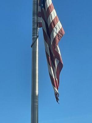 Disgraceful flying an old battered torn American flag !!!!!!!