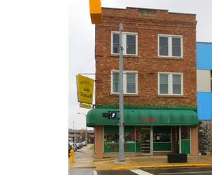Exterior of Healthy Dollar Holla in downtown Flint.
