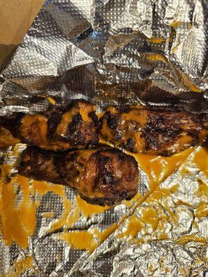 Burnt wings. Tried them but definitely tasted burnt.