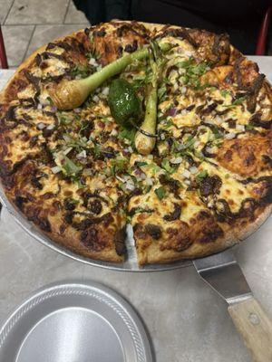 This is the Asado pizza ABSOLUTELY AMAZING MUST TRY