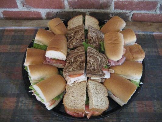 Let us cater your office party or meeting with an Assorted Sandwich Tray!