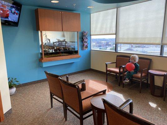 This is my kid AFTER his appointment. He would've been happy to stay there all day.