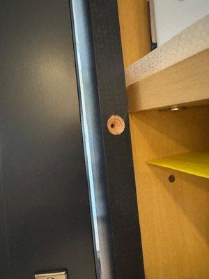 One of many drilled holes in error...