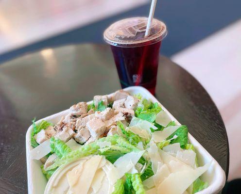 Caesar Salad w/ chicken, skip croutons; Iced Tea.