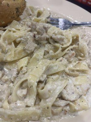 Chicken Alfredo. Barely any meat in it.