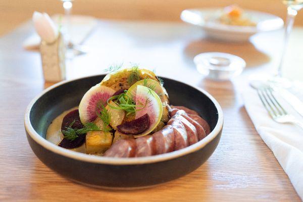 Kielbasa with braised cabbage and radish