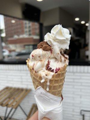 Vanilla Pudding Cone With Milo, Blackberry syrup and Whipped Cream