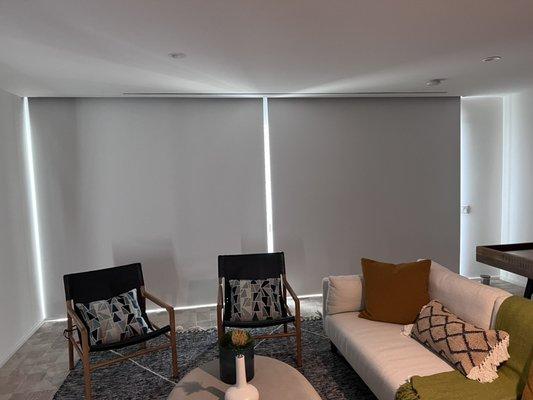 Motorized rolling shades