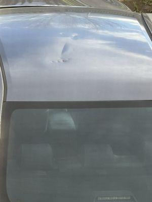 Where they dented the roof of my car, and didn't tell me. I noticed when I got home and looked from my second story window.