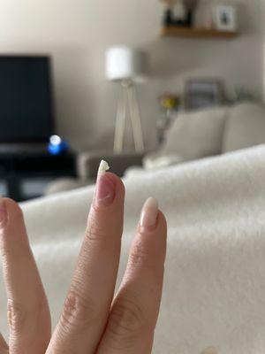 This is my nail a month later.... Literally broke in half because they were so thin due to them drilling my nails down so far