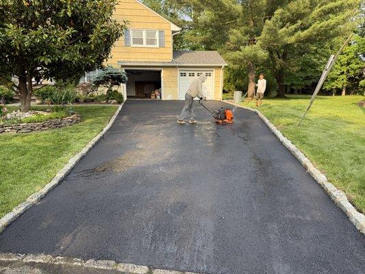 New asphalt driveway completed today