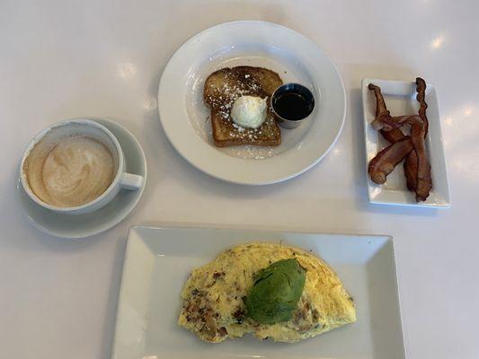 Cappuccino Omelet (build your own w/ bacon, Gouda, avocado) Came with side (I chose French toast) Additional Side - bacon