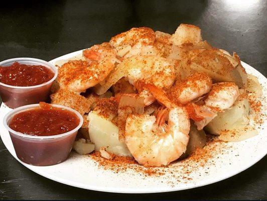 Our 1lb steamed peel and eat shrimp is a small plate that packs big flavors.