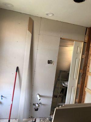 Pocket door with Sheetrock.