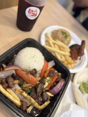 Lomo Saltado, and Chicha morada hiding in the background!