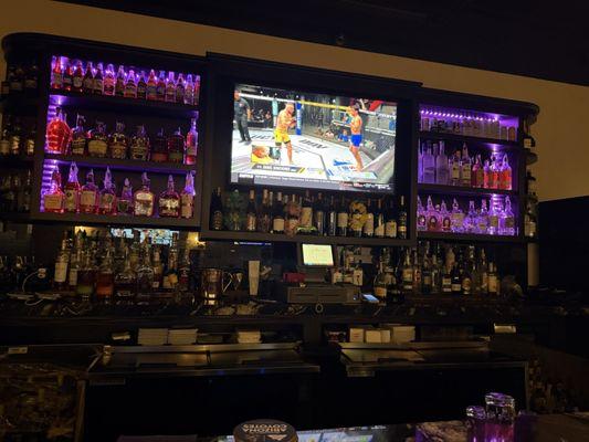 Full bar with multiple TVs