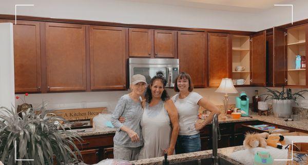 Friends helping me un-pack...I'm in the middle.