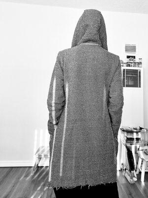 Mid-length, unisex, hooded jacket, with pockets. Brand: RNT-23. Made in Turkey.