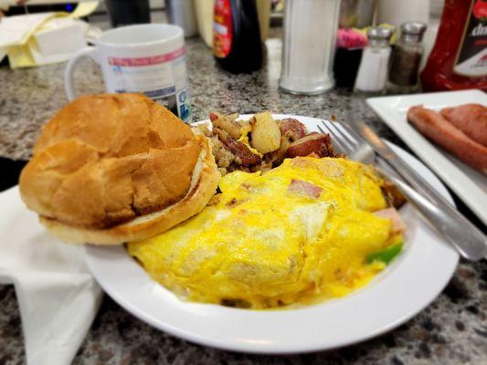 Western omelet, grilled bulkie roll and home fries